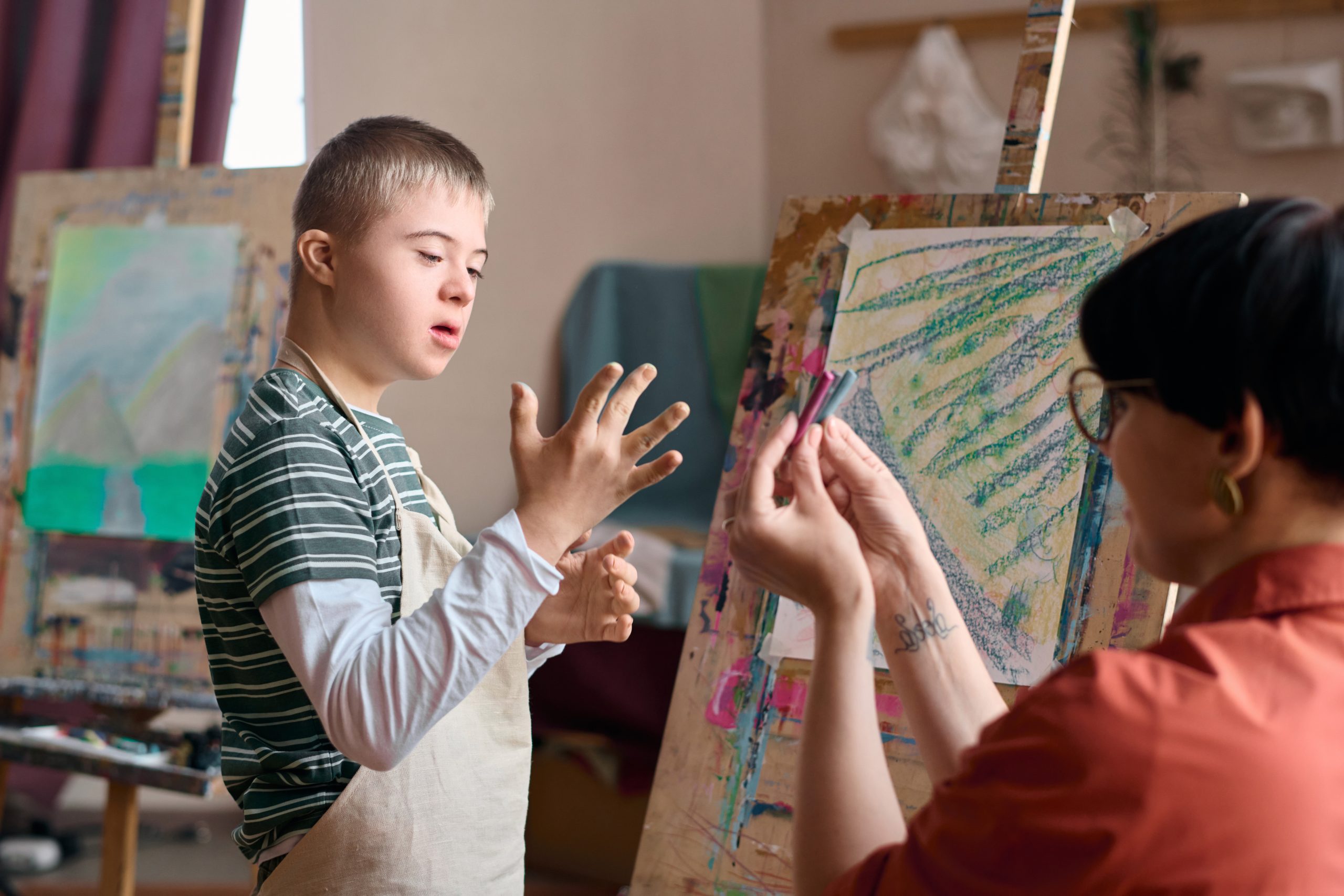 Boy with Down Syndrome Choosing Paint Colors