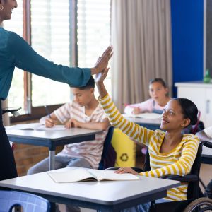 Teacher supporting student during special education document review